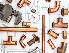 Knolling image using bronze and brass tools and hardware