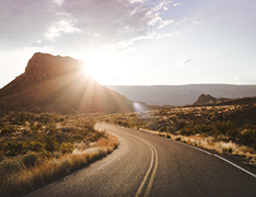open road winding through desert