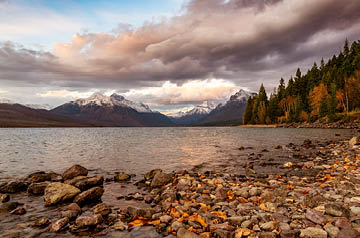 sunny day at lake, mountains behind