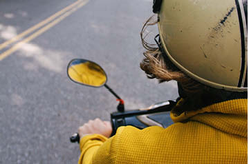 rider on moped