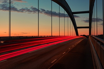 long exposure of bridge at sunset