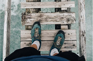 standing on weathered pier
