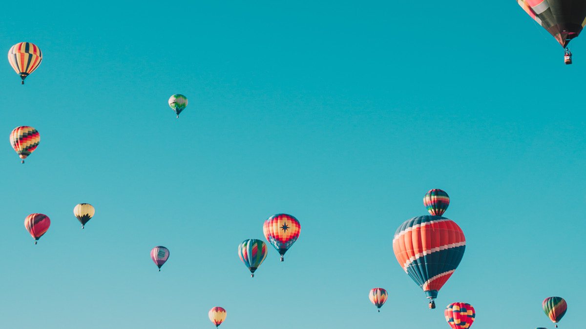several hot air balloons in the sky