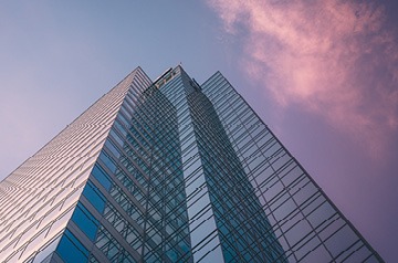skyscraper side reflecting sunset