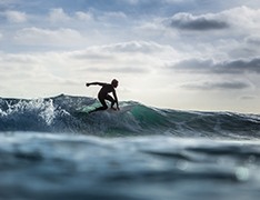 surfer on small wave