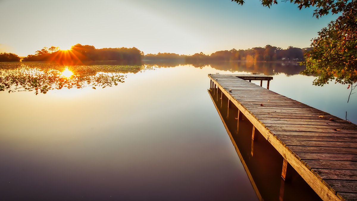 lake pier at sunset