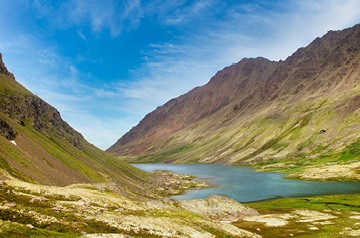 meadow between mountains
