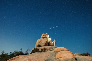 watching shooting star over desert