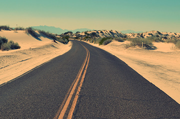 road through desert hills