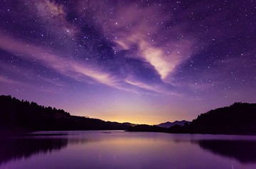 Night sky over lake