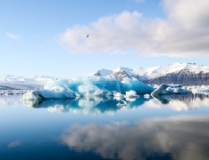 glacier under blue skies
