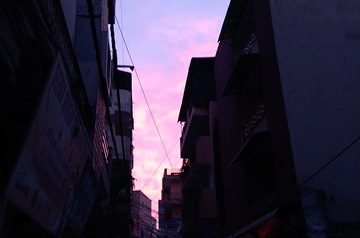 city alleyway at sunset