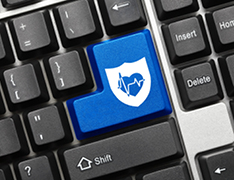 keyboard with Enter key replaced by blue shield icon