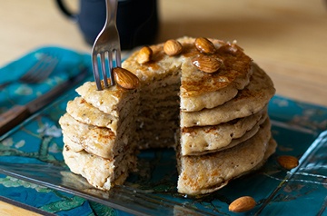 A fork in a stack of pancakes