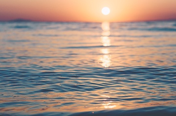 ocean surface at sunset