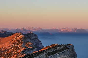 foggy mountaintops at sunset
