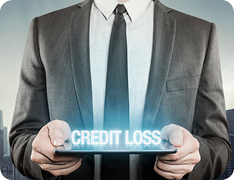 man holding tablet reading 'Credit Loss'