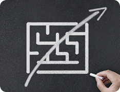 chalk drawing of arrow straight through complex maze