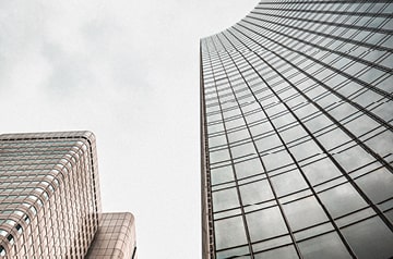 Looking upward along building with geometric design