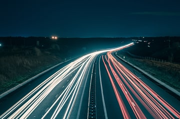 long exposure of dark highway at night