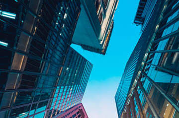 View looking up between skyscrapers