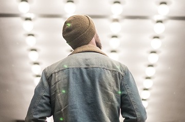 standing in lighting store