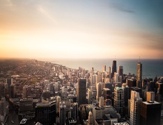 coastal city skyline at sunset