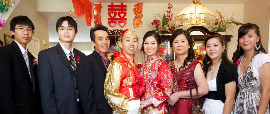 Jennie Ly and her family at her 2012 wedding. Jennie, the bride, and her husband, Danny, are dressed in traditional Chinese regalia