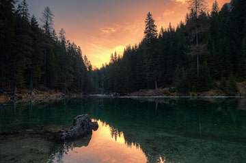 sunset over mountain lake