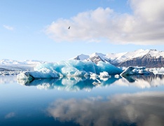 Snowcapped mountains on a lake