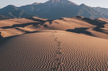 footprints in sand dunes
