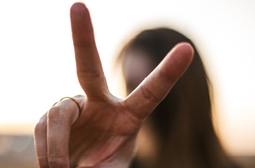 Someone giving the peace sign