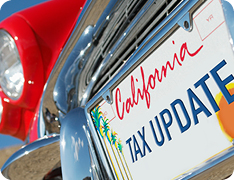 retro vehicle with CA license plate reading 'TAX UPDATE'