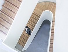 businessman descending stairwell