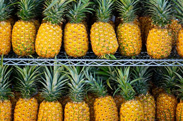 shelves of pineapples