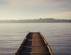 empty pier over lake