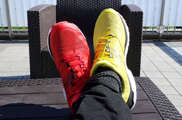 crossed legs and colorful sneakers