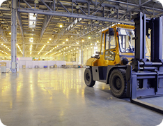 forklift in empty warehouse