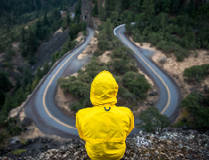 sharply curved road on mountainside